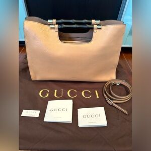 Gucci tan bamboo clutch with shoulder strap